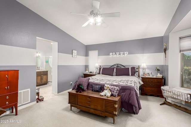 19822 N 108th Ave, Peoria, AZ 85373 - bedroom featuring vaulted ceiling, light colored carpet, connected bathroom, and a ceiling fan