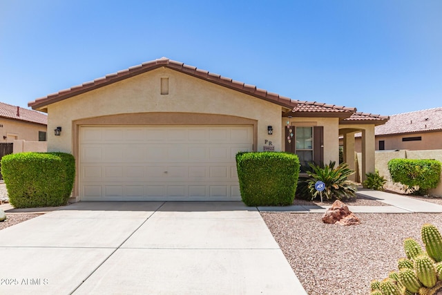 19822 N 108th Ave, Peoria, AZ 85373 - mediterranean / spanish-style house featuring driveway, stucco siding, a garage, and a tiled roof