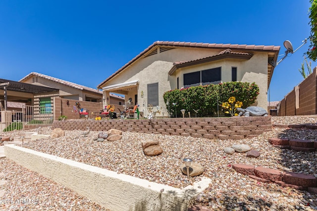 19822 N 108th Ave, Peoria, AZ 85373 - view of front of property with stucco siding and a tile roof