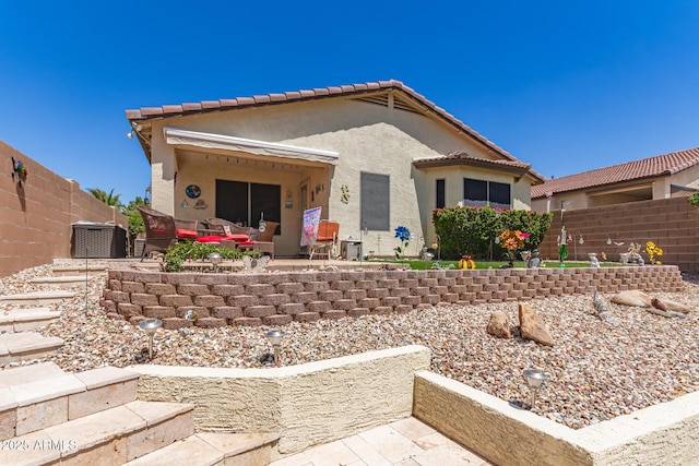 19822 N 108th Ave, Peoria, AZ 85373 - rear view of house with a patio, stucco siding, a tiled roof, and cooling unit