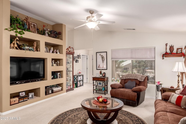19822 N 108th Ave, Peoria, AZ 85373 - living room featuring carpet floors, ceiling fan, lofted ceiling, and built in features