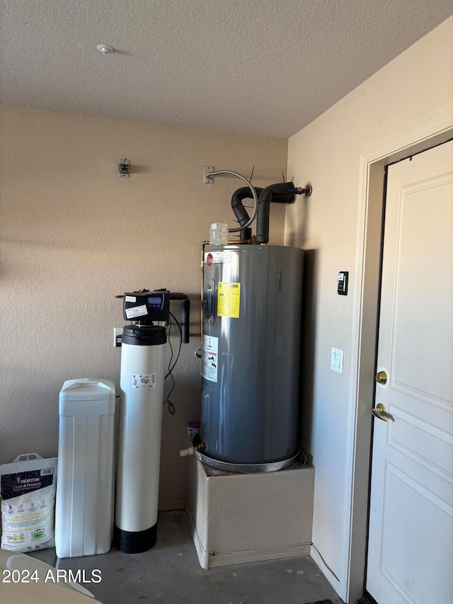 utility room featuring electric water heater