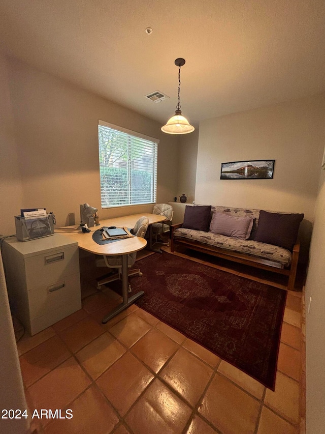 living room with light tile patterned floors