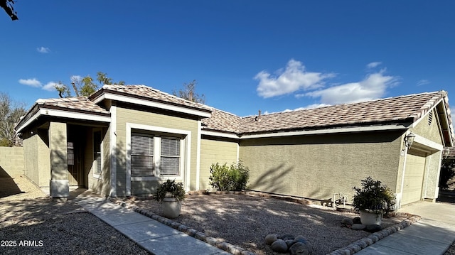 view of front of property featuring a garage