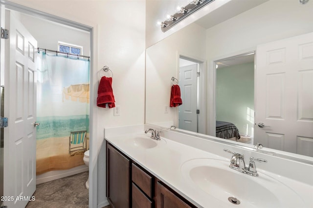 bathroom with a shower with curtain, vanity, and toilet