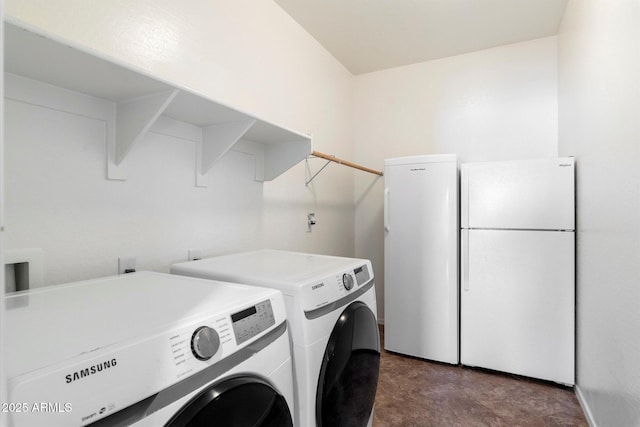 washroom with independent washer and dryer