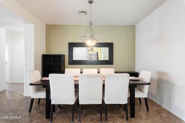 dining room with tile patterned floors