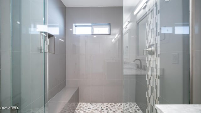 full bath featuring a shower stall