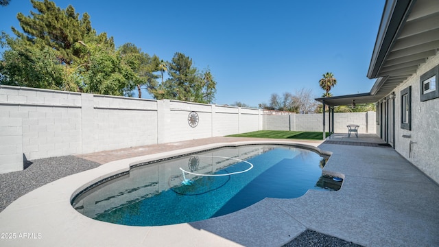 view of swimming pool with a fenced in pool, a patio, and a fenced backyard