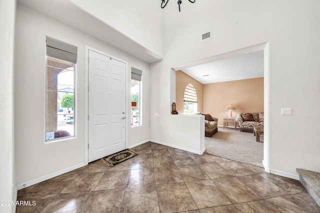 foyer entrance featuring tile patterned floors