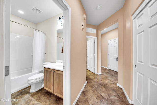 full bathroom with vanity, shower / bath combo with shower curtain, and toilet