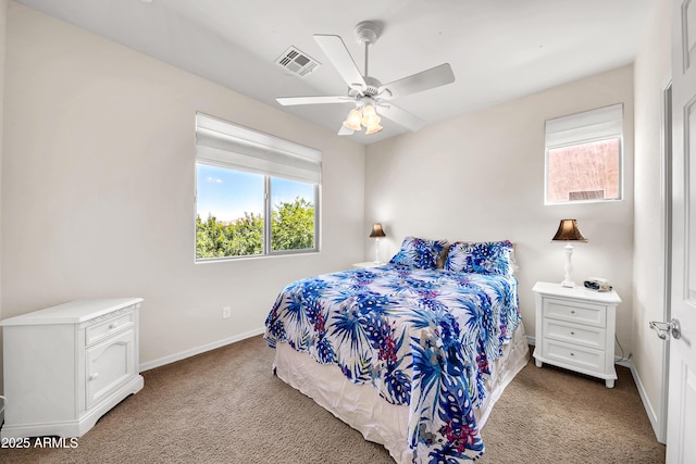 bedroom with light colored carpet and ceiling fan