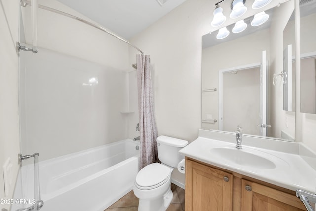 full bathroom featuring tile patterned floors, vanity, toilet, and shower / bath combo