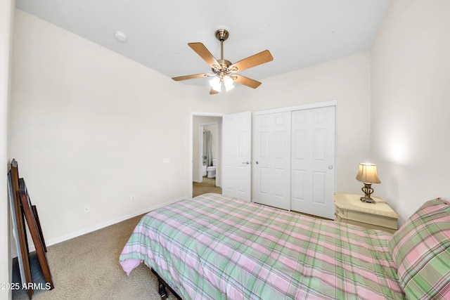 bedroom with ceiling fan, carpet floors, and a closet