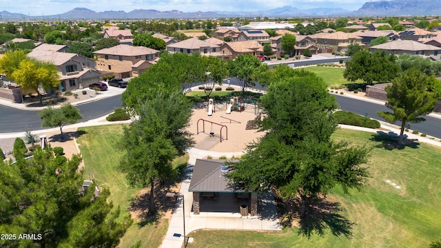 birds eye view of property featuring a mountain view