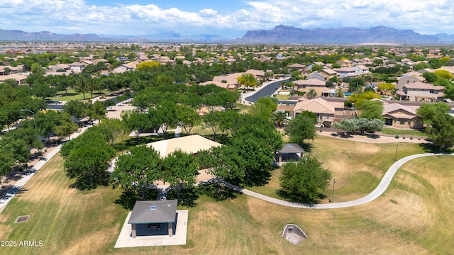 birds eye view of property with a mountain view