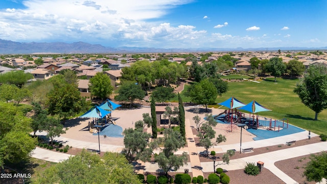 birds eye view of property with a mountain view