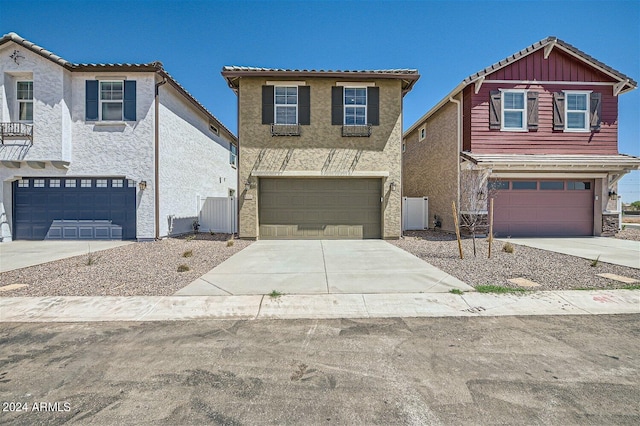 view of front of property with a garage