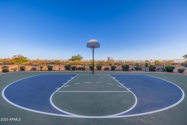 view of sport court featuring community basketball court and fence