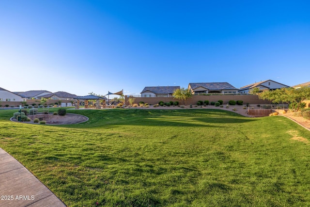 view of yard featuring a residential view