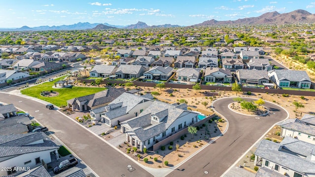 aerial perspective of suburban area featuring a mountainous background