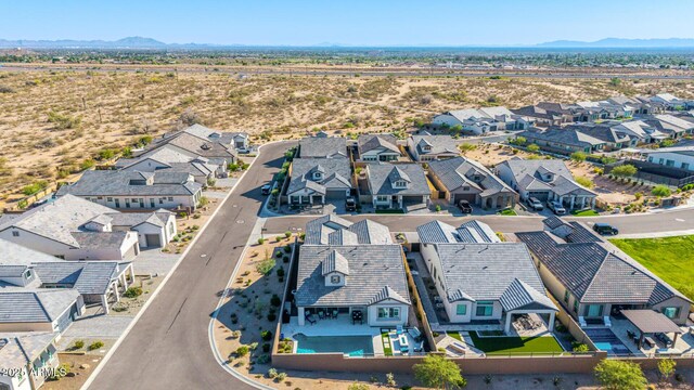 aerial perspective of suburban area with mountains