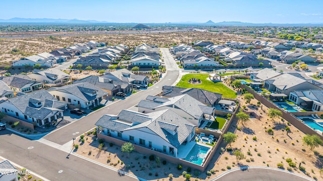 aerial perspective of suburban area with a mountainous background