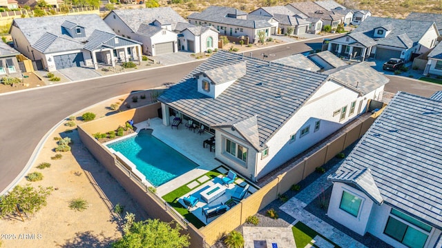 aerial perspective of suburban area with a pool
