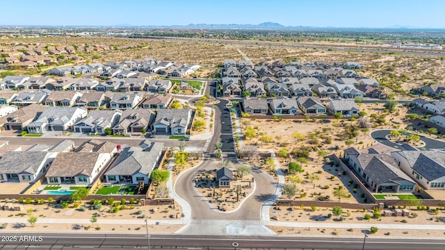 aerial view of residential area with a mountainous background