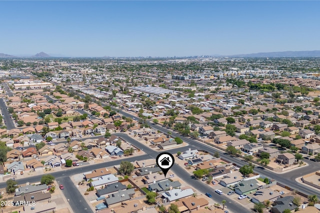 6938 W Nicolet Ave, Glendale, AZ 85303 - aerial view of property's location with a mountain backdrop and nearby suburban area