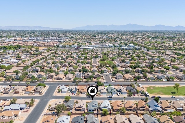 6938 W Nicolet Ave, Glendale, AZ 85303 - aerial overview of property's location featuring mountains and nearby suburban area