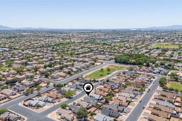 6938 W Nicolet Ave, Glendale, AZ 85303 - aerial view of property's location featuring a mountain backdrop and nearby suburban area