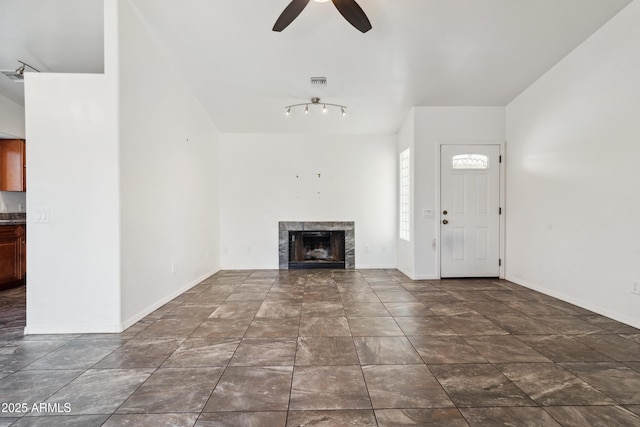 6938 W Nicolet Ave, Glendale, AZ 85303 - unfurnished living room featuring a fireplace, ceiling fan, and baseboards