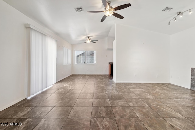 6938 W Nicolet Ave, Glendale, AZ 85303 - unfurnished living room featuring a ceiling fan and lofted ceiling