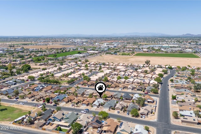 6938 W Nicolet Ave, Glendale, AZ 85303 - aerial overview of property's location featuring a mountainous background and nearby suburban area