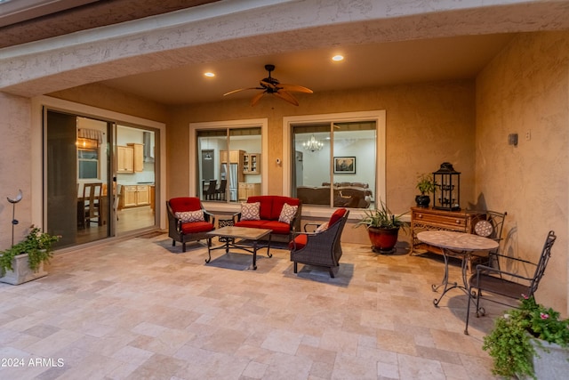 view of patio featuring an outdoor living space and ceiling fan