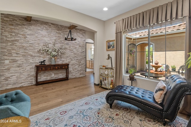 sitting room featuring light hardwood / wood-style floors