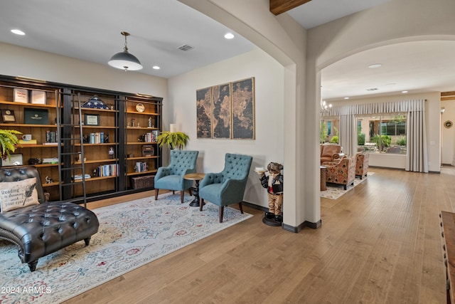 sitting room featuring hardwood / wood-style floors