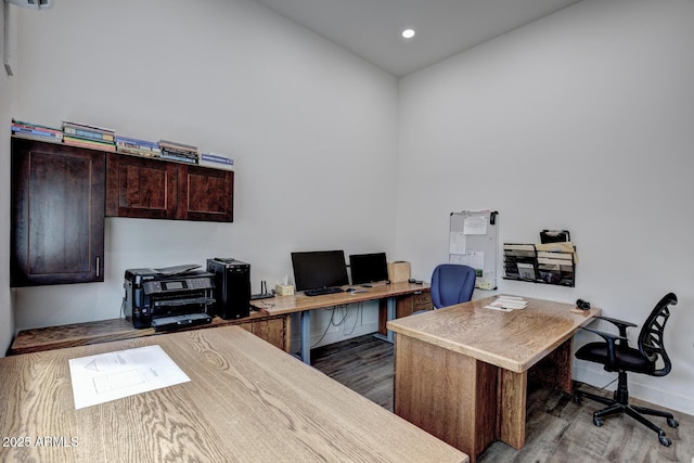 office featuring recessed lighting, baseboards, and wood finished floors