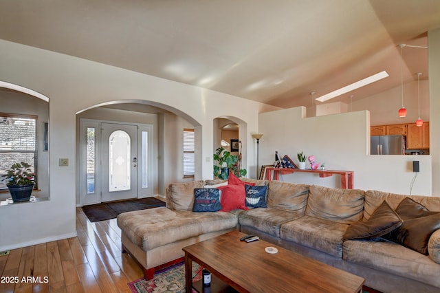 625 Shadow Mountain Dr, Prescott, AZ 86301 - living room with baseboards, vaulted ceiling, and hardwood / wood-style floors
