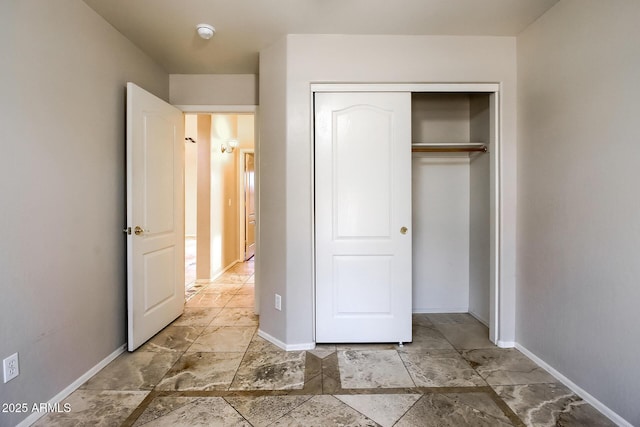 unfurnished bedroom with a closet