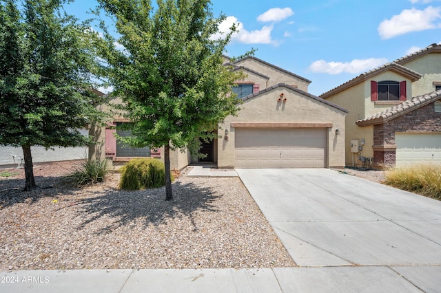 view of front of property featuring a garage