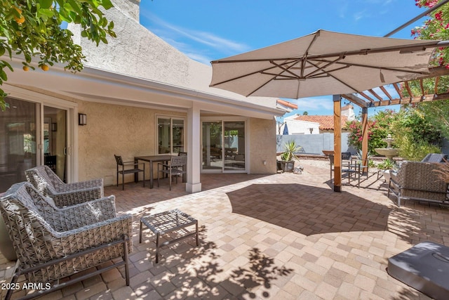 8719 E San Marino Dr, Scottsdale, AZ 85258 - view of patio / terrace with a pergola and fence