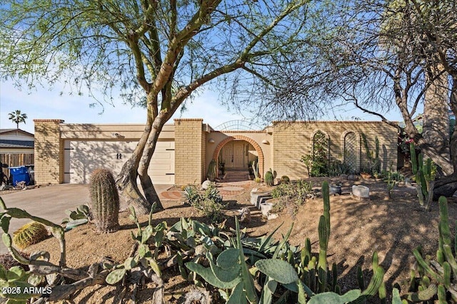 view of front of property with an attached garage and driveway