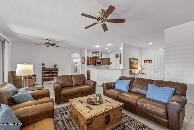 tiled living room featuring ceiling fan