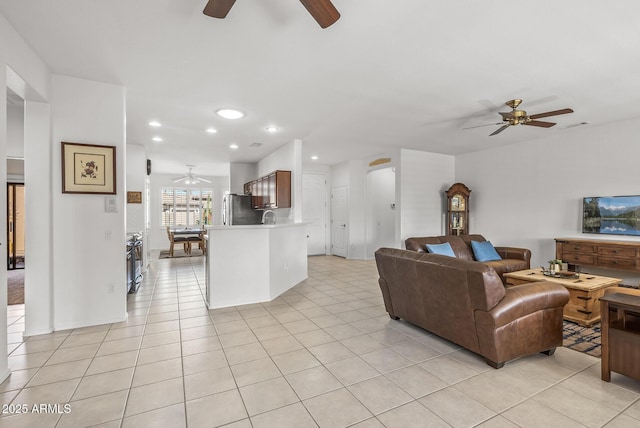 living room with light tile patterned flooring