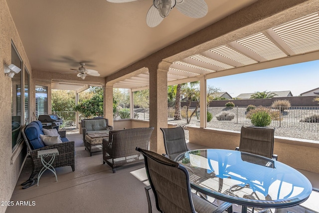 view of patio featuring an outdoor hangout area, ceiling fan, and a pergola