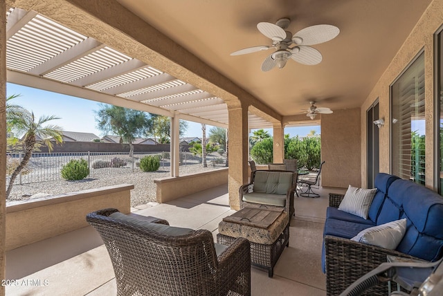 view of patio featuring ceiling fan, an outdoor living space, and a pergola