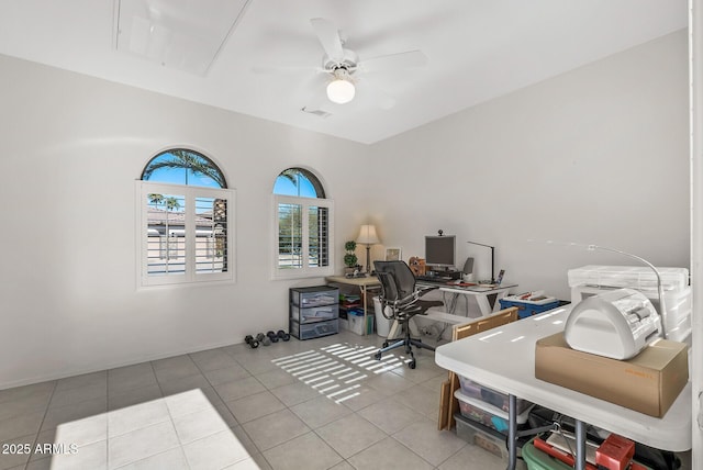 tiled office space with ceiling fan