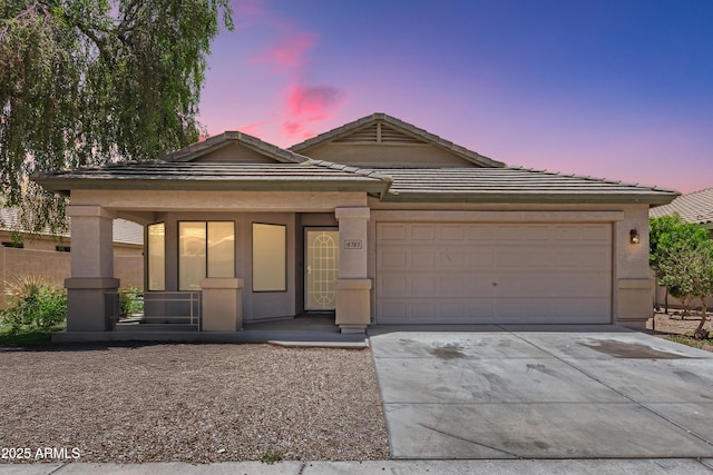 16783 W Taylor St, Goodyear, AZ 85338 - single story home featuring driveway, an attached garage, stucco siding, and a tiled roof